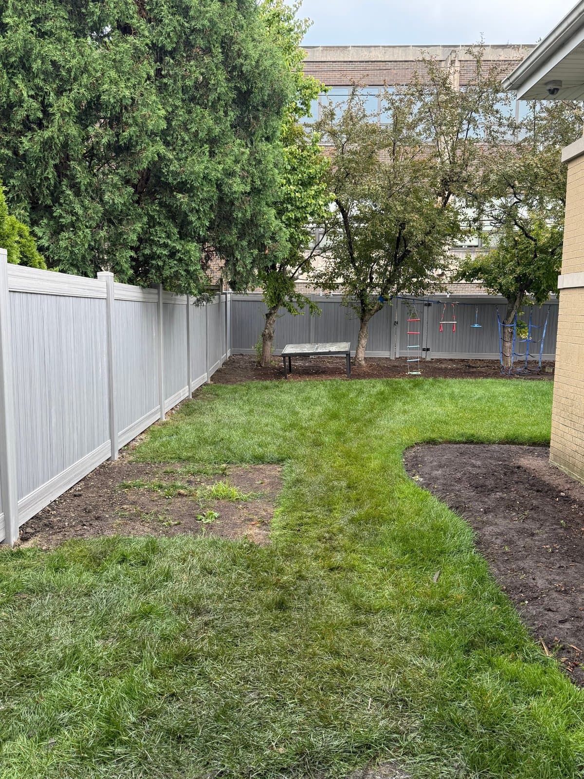 Cedar wood privacy fence installation